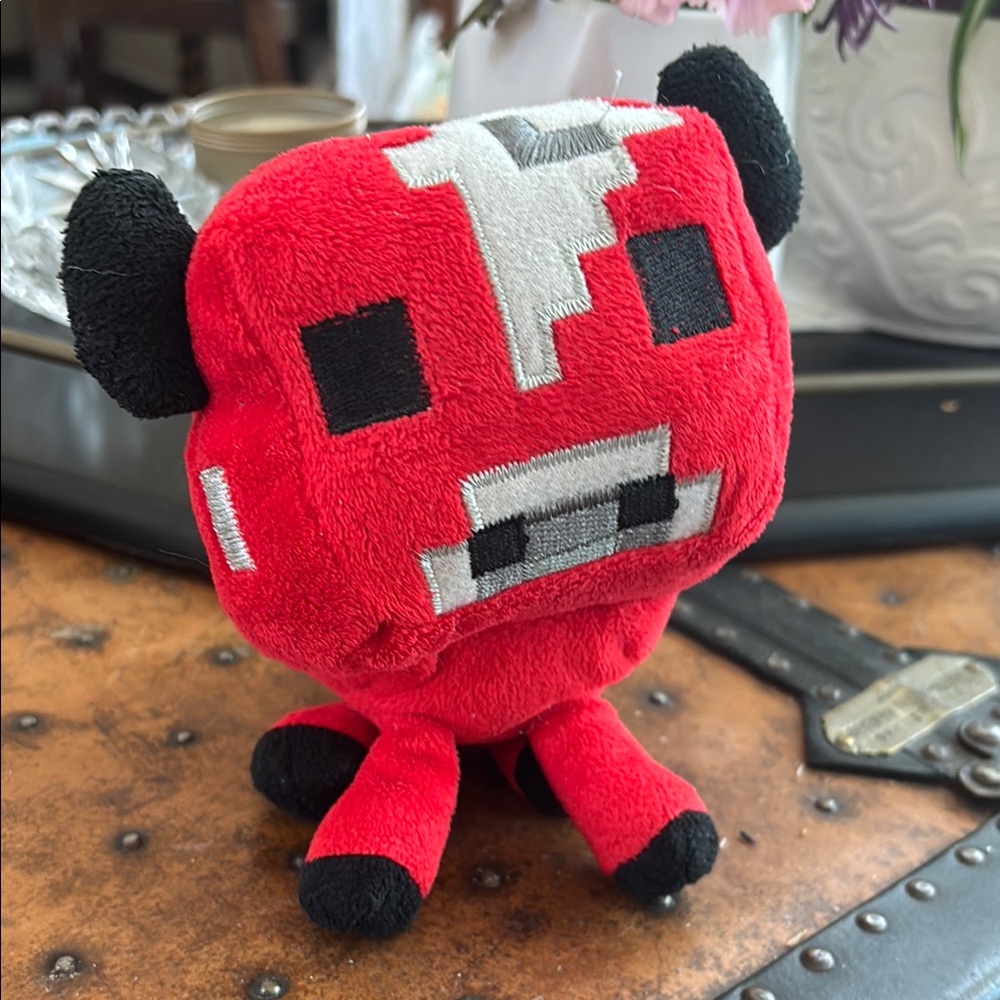 Red and Black Plush Toy
